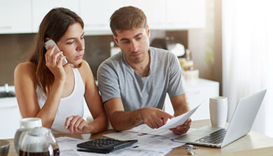 couple creating a debt management plan